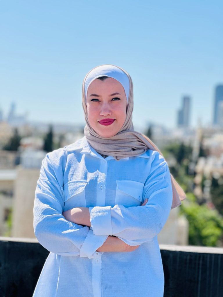 A portrait of Teacher Rahma Al Hawari, an expert in teaching Arabic in Jordan, at Misbah Center 