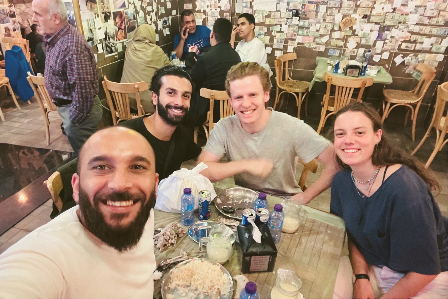 Students practicing Levantine Arabic dialect during a cultural dining experience in Amman, Jordan