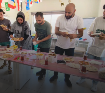 International students enjoying a cultural activity and practicing Arabic at Misbah Center in Amman