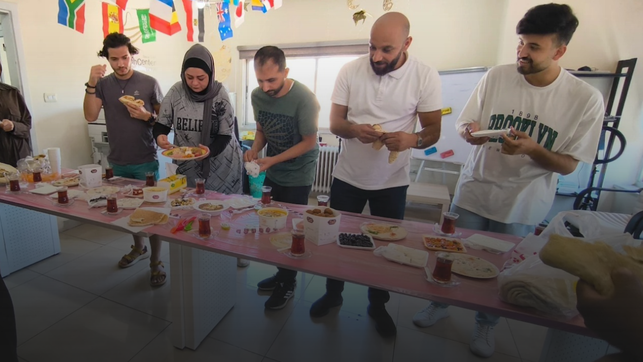 International students enjoying a cultural activity and practicing Arabic at Misbah Center in Amman